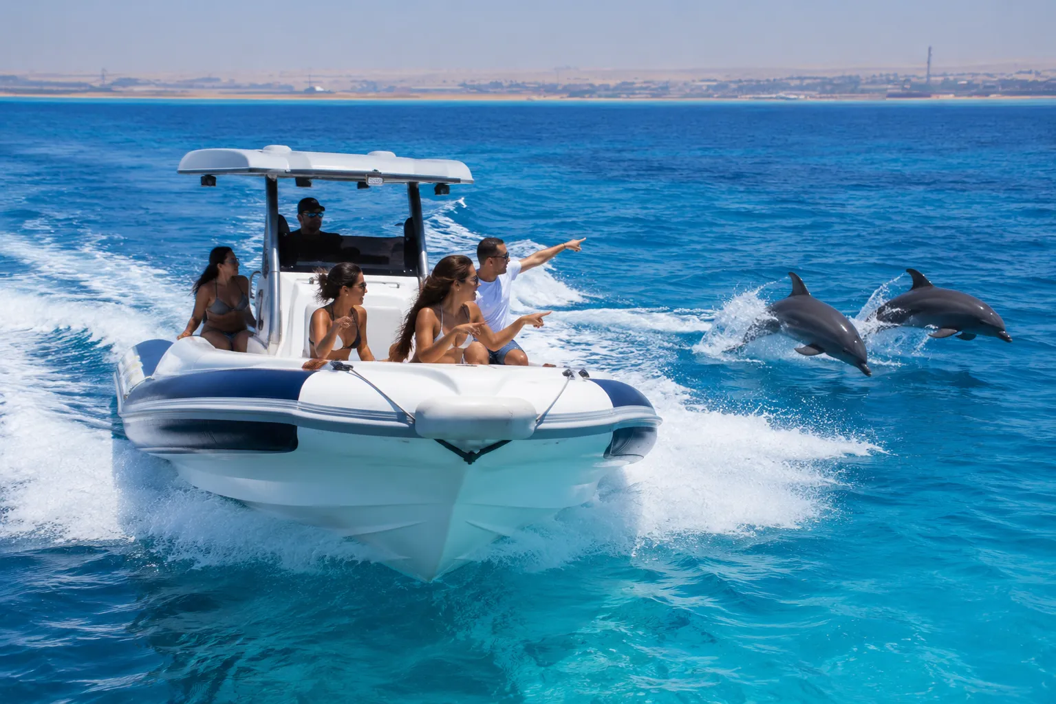 Clear turquoise water and living reef on the Dolphin House speedboat trip in Hurghada